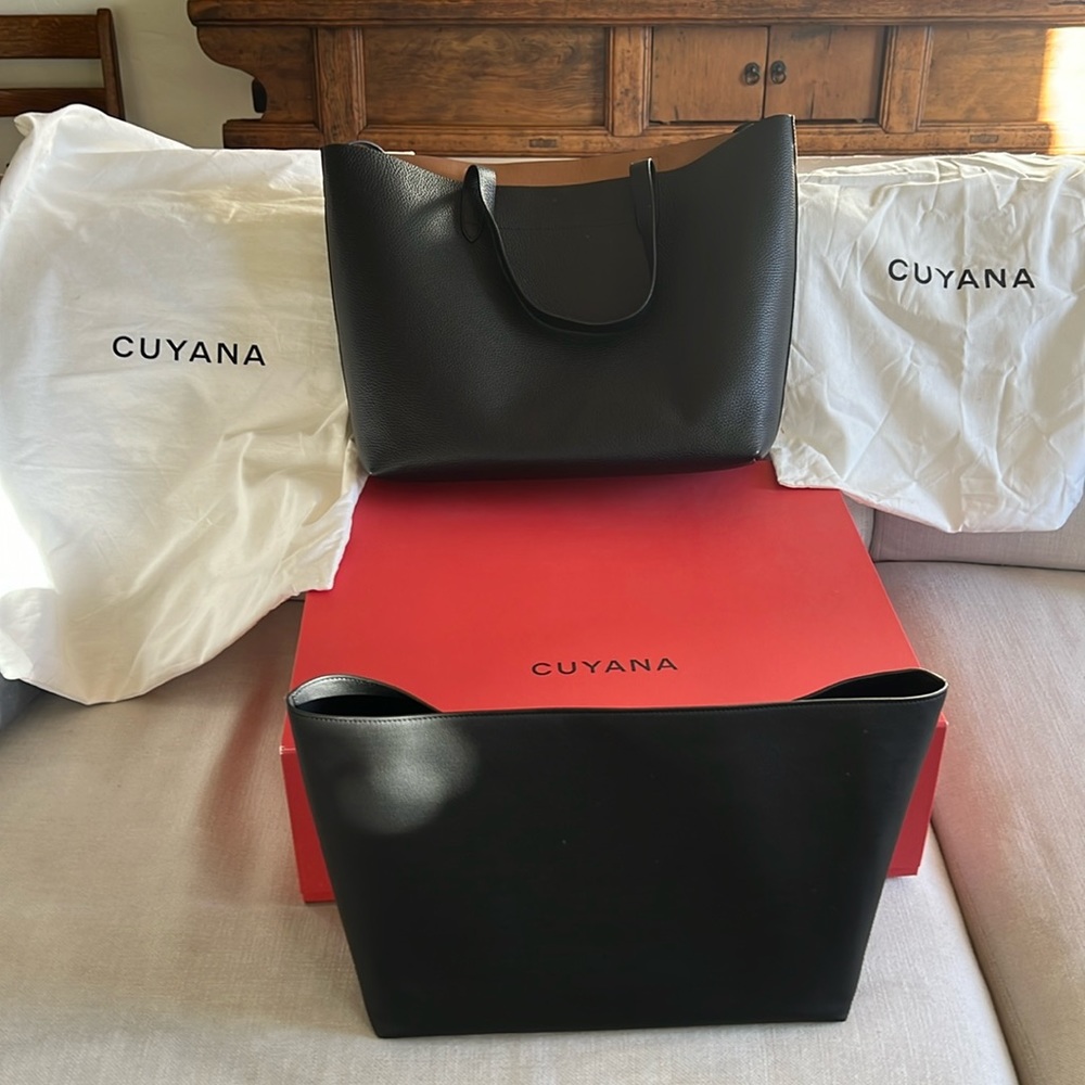 Large Classic leather tote with organizer insert, duster bags and gift box.